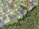 An aerial shot of the house, with other houses nearby at 10675 Fairhaven Way, Orlando, FL 32825