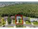 Overhead view of the property, highlighting its location in a lush, green neighborhood at 10675 Fairhaven Way, Orlando, FL 32825