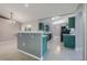This kitchen offers a breakfast bar that overlooks the main living area and stainless steel appliances at 10675 Fairhaven Way, Orlando, FL 32825