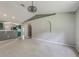 This living room offers arch details, neutral colors, and views of the kitchen at 10675 Fairhaven Way, Orlando, FL 32825