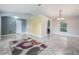 Bright and airy living room with an arched doorway to the kitchen at 10675 Fairhaven Way, Orlando, FL 32825