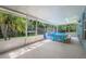 Enclosed patio featuring an above-ground pool at 10675 Fairhaven Way, Orlando, FL 32825