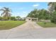 Exterior shot of home featuring carport and landscaping at 1204 Marie Ave, Apopka, FL 32703
