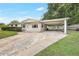 Front exterior of home with a carport at 1204 Marie Ave, Apopka, FL 32703