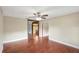 Bright living area featuring beautiful wood-look floors and an open layout at 1204 Marie Ave, Apopka, FL 32703