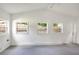 Utility room featuring windows and neutral walls at 1204 Marie Ave, Apopka, FL 32703