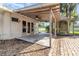 Covered patio area with ceiling fans plus a gazebo in the backyard at 123 Se 1St Ave, Webster, FL 33597
