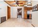View of kitchen with wood cabinets, tile flooring, and dated appliances at 123 Se 1St Ave, Webster, FL 33597
