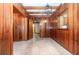 Charming living area with paneled walls and tile floors at 123 Se 1St Ave, Webster, FL 33597
