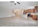 Spacious living area features tile floors, an open floor plan, and lots of natural light at 1246 Payne Stewart Dr, Davenport, FL 33896