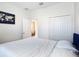 Cozy bedroom featuring soft bedding and a closet with plenty of storage space at 129 Boydfield Ln, Davenport, FL 33837
