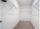 Walk-in closet equipped with multiple wire shelves, providing ample storage space at 129 Boydfield Ln, Davenport, FL 33837