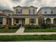 Charming two-story home with well-manicured lawn and inviting front entrance at 129 Boydfield Ln, Davenport, FL 33837