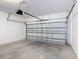 Spacious two-car garage featuring an automatic door at 129 Boydfield Ln, Davenport, FL 33837