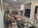 Open-concept living room perfect for entertaining, featuring stylish decor at 129 Boydfield Ln, Davenport, FL 33837