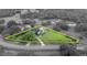 Aerial view displaying estate property with landscaping and property lines on large lot at 1415 Brumley Rd, Chuluota, FL 32766