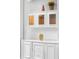 Close up on custom built-in shelving and cabinets, perfect for displaying decor at 1415 Brumley Rd, Chuluota, FL 32766