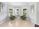 Bright sitting area with large windows, offering scenic views and comfortable seating at 1415 Brumley Rd, Chuluota, FL 32766
