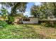 Spacious backyard offers plenty of room for recreation and relaxation at 1422 Russell Ave, Orlando, FL 32806