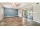 Bedroom with hardwood floors, a ceiling fan, and sliding glass doors providing access to an outdoor area at 1422 Russell Ave, Orlando, FL 32806