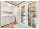 A practical laundry area with washer, dryer, and direct entry at 1422 Russell Ave, Orlando, FL 32806