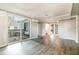 Spacious living room with sliding glass doors to the patio and a seamless flow to other living spaces at 1422 Russell Ave, Orlando, FL 32806
