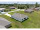 Aerial view showing the roof, yard, and placement of the home at 14322 Sw 28Th Ave, Ocala, FL 34473