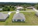 An overhead aerial view of the home and it's surrounding grassy lot at 14322 Sw 28Th Ave, Ocala, FL 34473