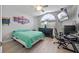Bright bedroom featuring an arched window, a ceiling fan and ample room for both sleep and study at 14566 Quail Trail Cir, Orlando, FL 32837