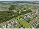 Aerial view showcasing homes close to the Kindred Amenity Center and park, offering recreation at 1565 Diamond Loop Dr, Kissimmee, FL 34744