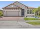 Charming single-Gathering home featuring a two-car garage and well-manicured landscaping at 1709 Benoit Ter, Davenport, FL 33837