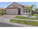 Charming single-story home with a well-maintained front yard and lush landscaping at 1709 Benoit Ter, Davenport, FL 33837