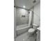 Modern bathroom features a shower-tub combination and stylish fixtures at 1732 Sw 6Th St, Ocala, FL 34471