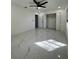 Bright bedroom featuring marble floors, neutral paint, and ample closet space at 1732 Sw 6Th St, Ocala, FL 34471