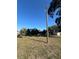 Front exterior featuring mature landscaping, shade trees and a single story structure at 1732 Sw 6Th St, Ocala, FL 34471