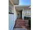 Charming front entrance with brick steps leading to the front door at 1732 Sw 6Th St, Ocala, FL 34471