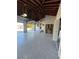Interior view of a large garage featuring newly painted floors, ample space, and garage door access at 1732 Sw 6Th St, Ocala, FL 34471