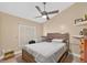 Bedroom with ceiling fan and window providing natural light at 1803 Tillstream Dr, Orlando, FL 32818
