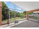 Covered and screened patio with a concrete floor, ideal for outdoor relaxation or entertainment at 1803 Tillstream Dr, Orlando, FL 32818