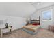 Cozy bedroom with a sloped ceiling, and natural light at 2076 Shannon Lakes Blvd, Kissimmee, FL 34743