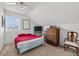 Bedroom featuring sloped ceiling, natural light, and carpet at 2076 Shannon Lakes Blvd, Kissimmee, FL 34743