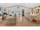 Spacious open-concept living area with fireplace and dining space, perfect for entertaining at 2076 Shannon Lakes Blvd, Kissimmee, FL 34743