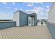 Roof deck with wood floors with open door to the interior at 2290 Brix Sts, Orlando, FL 32804