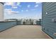Roof deck with wood floors and railing overlooking the area at 2290 Brix Sts, Orlando, FL 32804