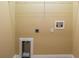 The laundry room has connections for a washer and dryer at 2673 Rutledge Ct, Winter Haven, FL 33884