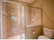 Contemporary shower with glass enclosure, tile surround, and a convenient layout, providing a spa-like experience at 2673 Rutledge Ct, Winter Haven, FL 33884