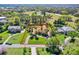 Aerial view of estate with lush landscaping, a large yard, and a private pool in a desirable location at 3130 Butler Bay N Dr, Windermere, FL 34786