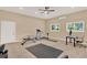 Bright home gym offers lots of space with multiple windows and neutral tones, perfect for staying active at 3130 Butler Bay N Dr, Windermere, FL 34786