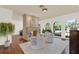 Bright living room boasts hardwood floors, fireplace, arched windows and an open floor plan at 3130 Butler Bay N Dr, Windermere, FL 34786