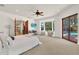 Spacious main bedroom with sitting area, bay window, and private bathroom at 3130 Butler Bay N Dr, Windermere, FL 34786